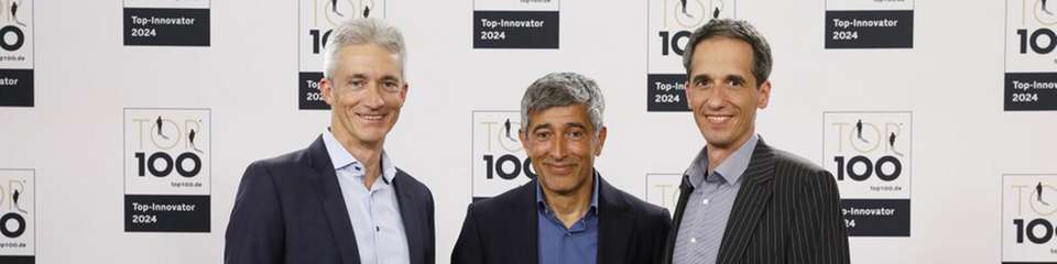 Dr. Udo Haberland, Ranga Yogeshwar und Frank Schwenker bei der Auszeichnung von Faulhaber: Das Unternehmen gehört zu den Top 100 innovativen Unternehmen.